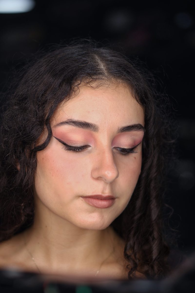 Pink cut-crease eye look with winged eyeliner